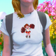 Students like this University of Colorado junior are excited to once again display their breasts, sporting form-fitting Urban Outfitter T-shirts in response to warm spring weather.